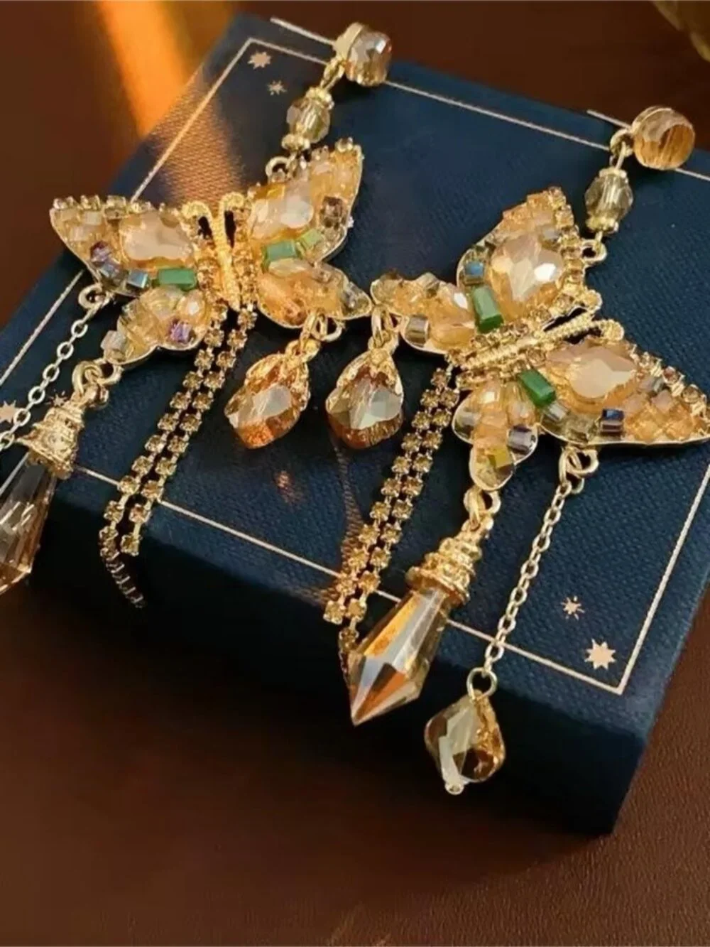 Gold Crystal Butterfly Drop Earrings with Green Accents